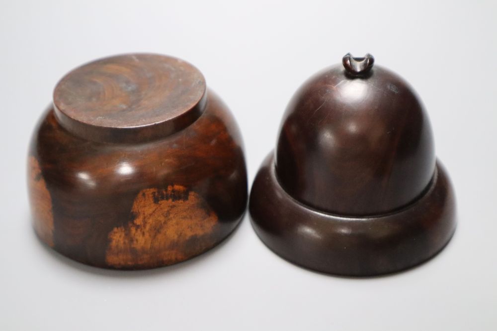 A 19th century lignum vitae turret shaped jar and cover, a similar acorn shaped string box and bowl, and a stained sycamore and engine